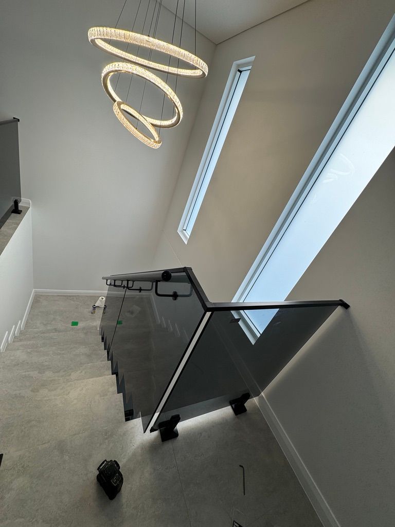 Black hardware glass balustrade from above
