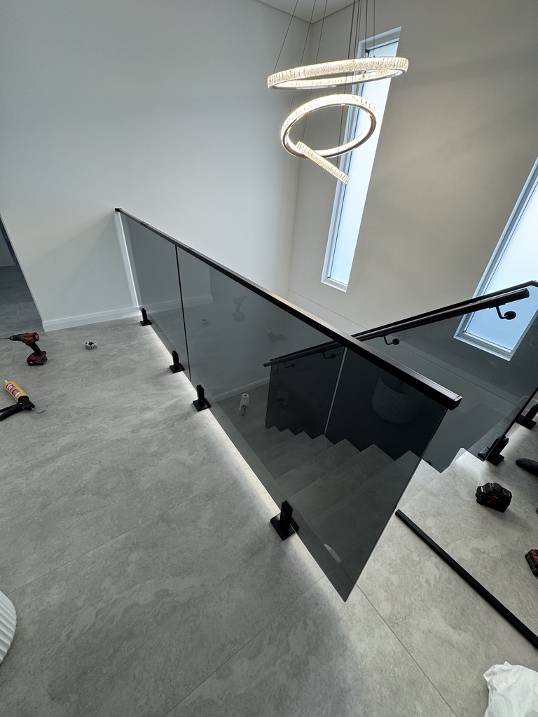 Overhead view of staircase glass panels